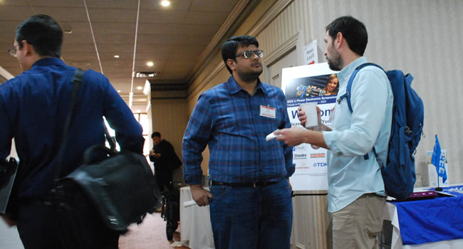 Colleagues and old friends catch up at the 2024 IEEE LI Power Electronics Symposium